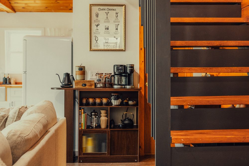 Coffee and tea bar with pour-over kettle, hand grinder, espresso machine, French press and matcha set