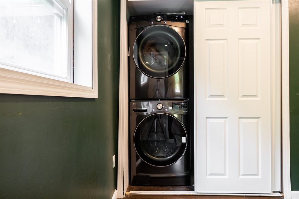 Stacked washer and dryer in the cabin