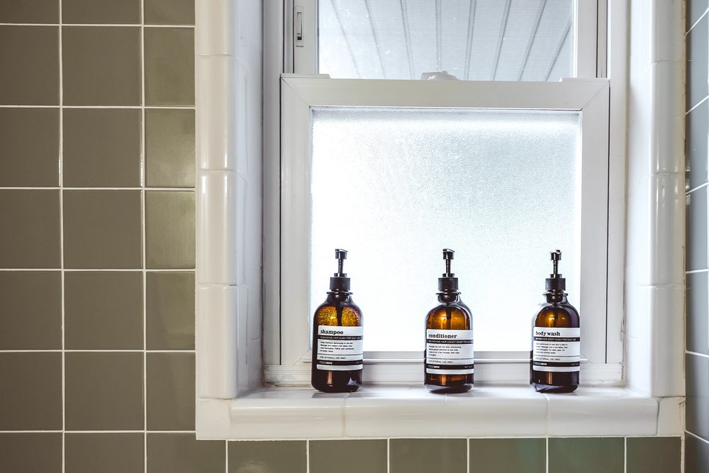 Bath products in the tiled shower